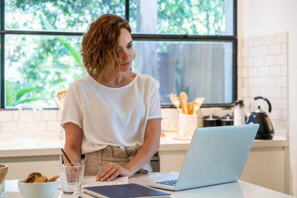 istock Woman working on laptop 1269131389