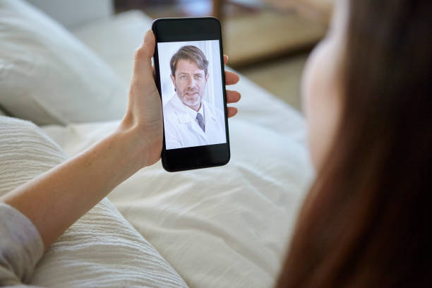 istock Woman having video call with doctor 1269131525