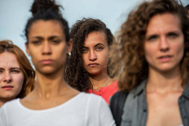 istock Women standing together 1269132327