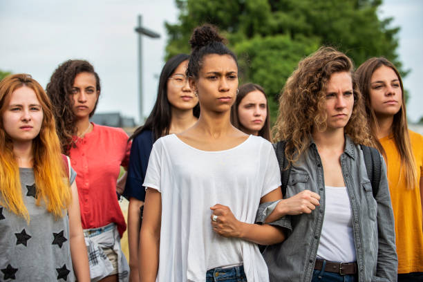 istock Women standing together 1269132329