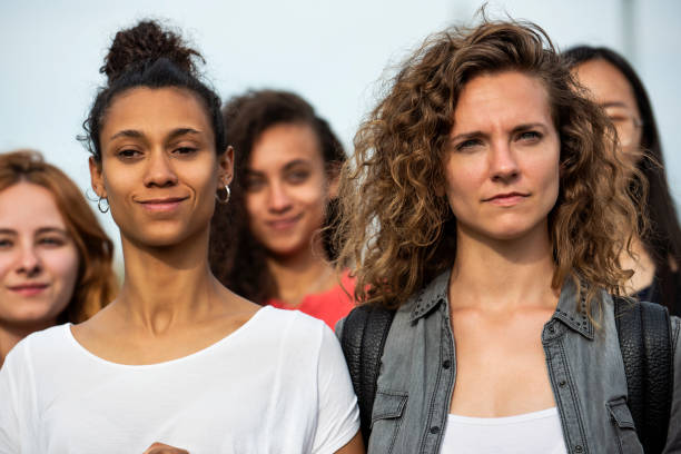 istock Women standing together 1269132334