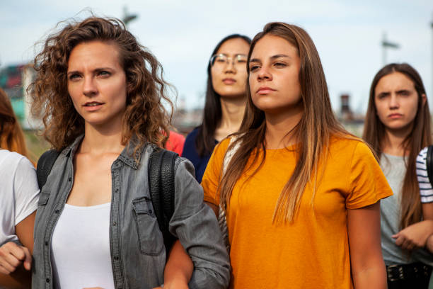 istock Women standing together 1269132335