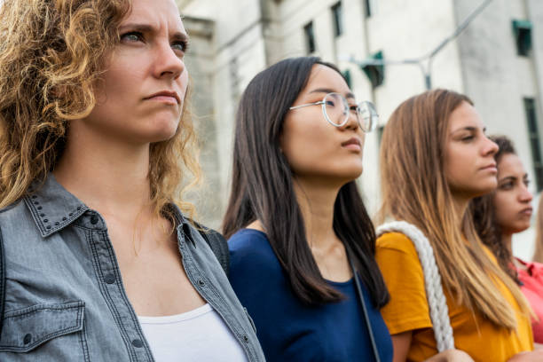 istock Women standing together 1269132339