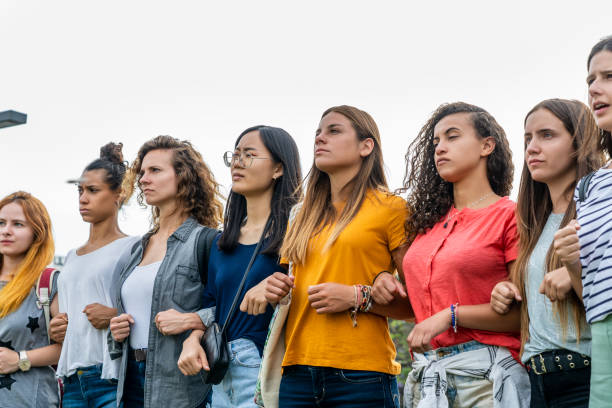istock Women standing together 1269132344