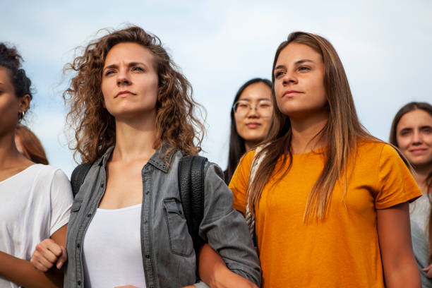 istock Women standing together 1269132345