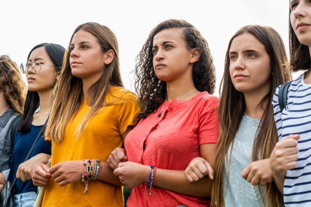 istock Women standing together 1269132346