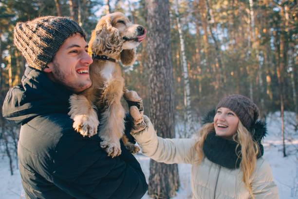 istock Winter couple having fun playing in snow 1269132778