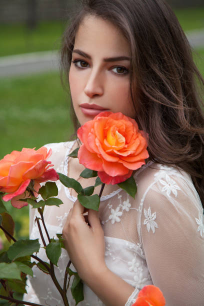 woman beauty portrait in flower garden