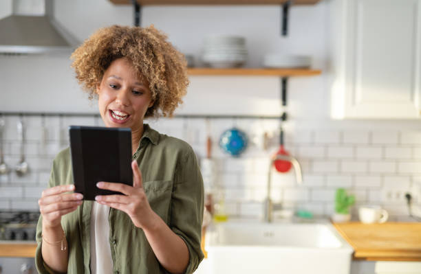 istock Woman Having A Video Conference From Her Home 1269136276