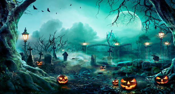 Pumpkins In Graveyard In The Spooky Night - Halloween Backdrop Jack o' Lantern With Tombstones In The Spooky Cemetery - Halloween Background jack o lantern photos stock pictures, royalty-free photos & images