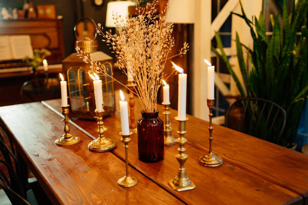 istock table with dry flowers and burning candles 1269139988