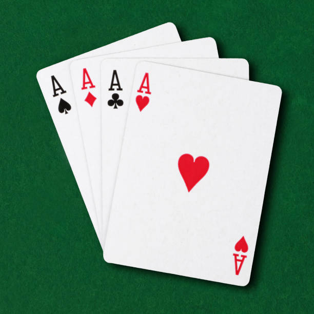 Four Aces on green card table poker winning hand business concept Four Aces on a green card table poker winning hand business concept blackjack illustrations stock illustrations