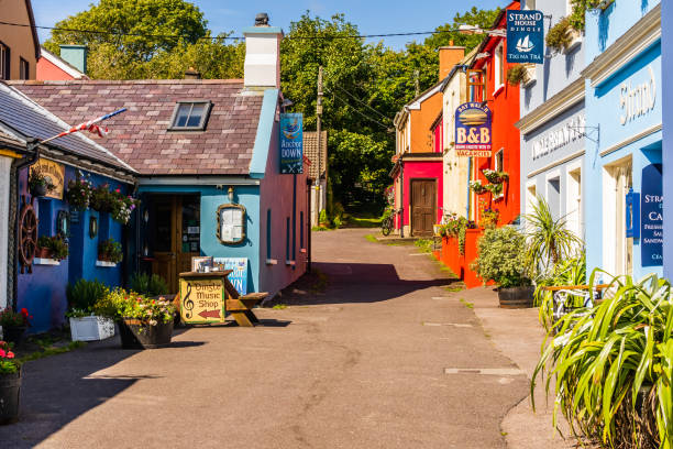 Colourful buildings around the coastal village of Dingle Dingle, Ireland, Aug 2018 Colourful buildings, pubs, shops and restaurants around the coastal city of Dingle in County Kerry facade store old built structure stock pictures, royalty-free photos & images