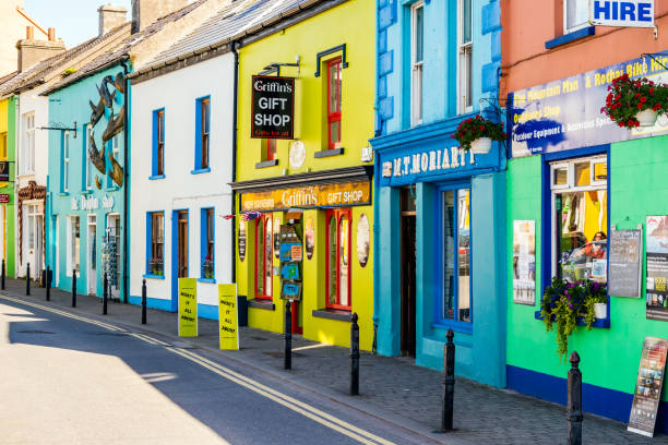 Colourful buildings around the coastal village of Dingle Dingle, Ireland, Aug 2018 Colourful buildings, pubs, shops and restaurants around the coastal city of Dingle in County Kerry dingle peninsula stock pictures, royalty-free photos & images