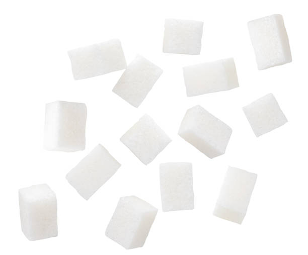 istock Refined sugar cubes are flying on a white. Isolated 1269146645
