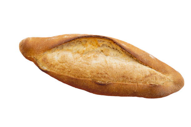 Closeup on a Turkish bread also called ekmek locally. Object cut out on a white background ready for color toning stock photo