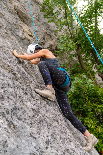 istock Mountain climbing training. challenging herself on this climb. Determined to reach the top 1269152191