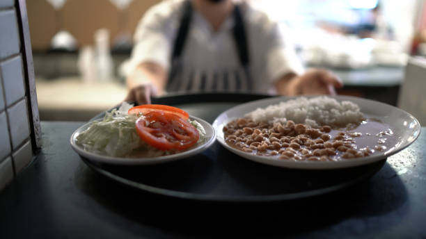 Waitress receiving a fresh dish