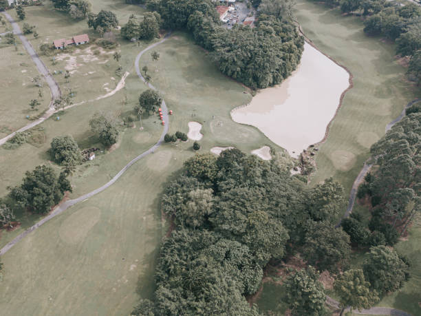istock Drone point of view golfer playing golf in golf course in melaka 1269152421