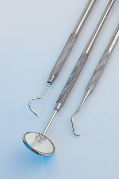 istock Dental tools in a clinical blue light 1269152430