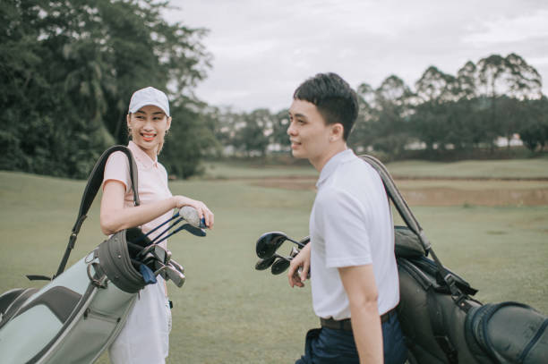 istock asian chinese couple golfer walking in golf course getting ready to play golf during weekend happily 1269152735