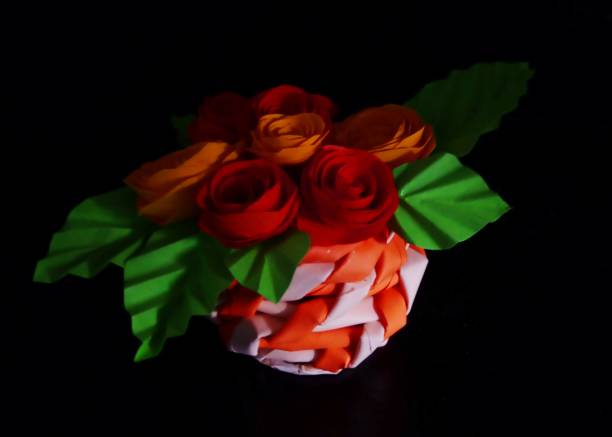 paper craft - hand craft, beautiful colorful paper craft flower basket stock photo