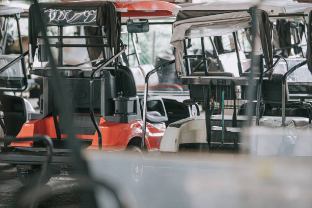 istock golf cart in a row at golf course parking lot 1269153449
