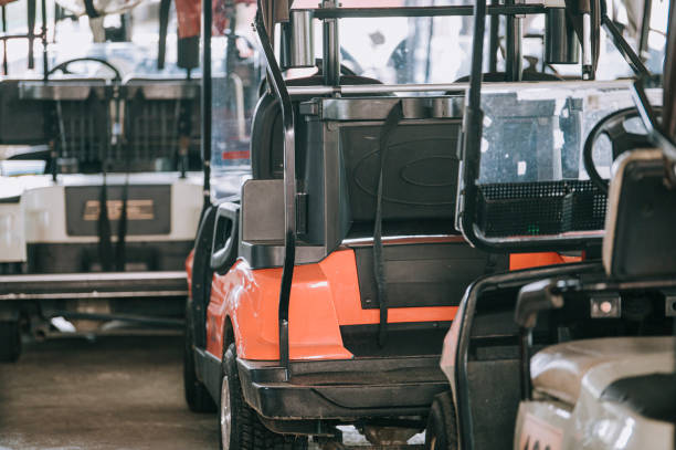 istock golf cart in a row at golf course parking lot 1269153546