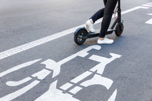 istock Young woman riding electric scooter 1269156052