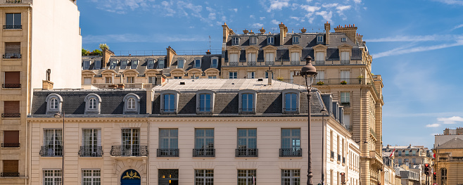 Paris, typical facades, ancient buildings boulevard des Invalides