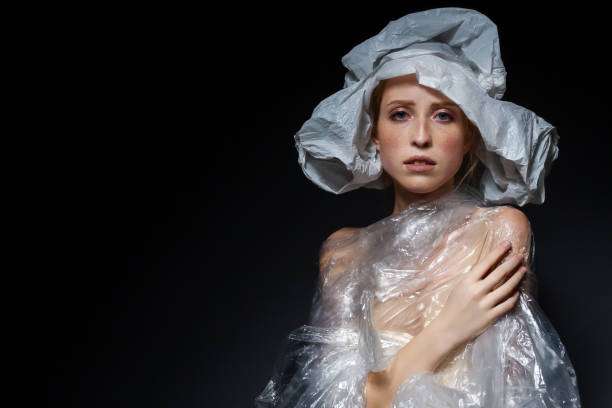 istock Fashion young woman with plastic garbage. Environment issue concept 1269159416
