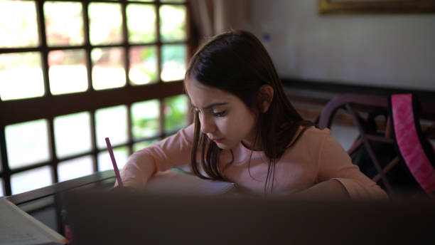 istock Girl studying from home 1269160367