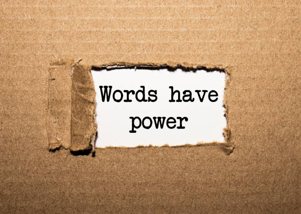 istock The text WORDS HAVE POWER. behind torn brown paper 1269160500