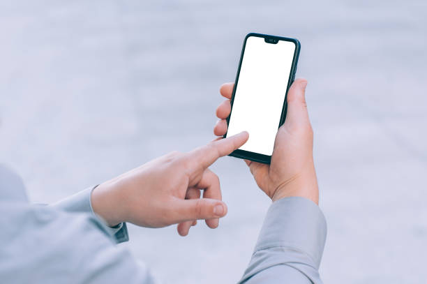 istock Mock-up technology. Businessman holds a smartphone in his hands close-up. 1269163624