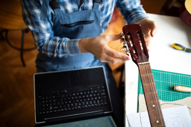 istock Repairing guitar 1269166228