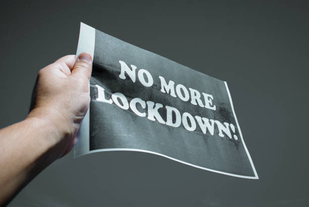 istock Protester holding a sign with the message 