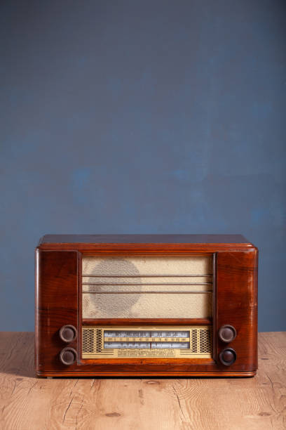 istock vintage radio receiver in front of textured table background 1269172110