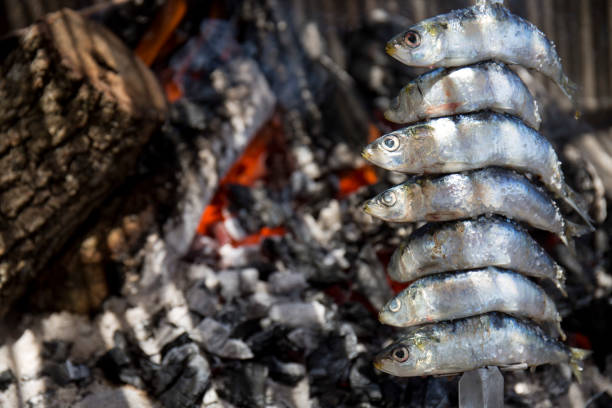 istock Sardines skewer. Sardines prepared on fire in a traditional way 1269176280