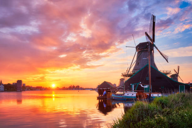 istock Windmills at Zaanse Schans in Holland on sunset. Zaandam, Nether 1269177871
