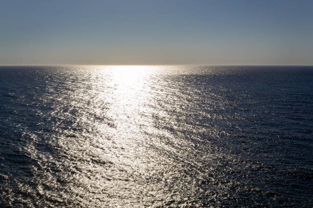 istock Sunset over the sea, light reflection on water 1269180132