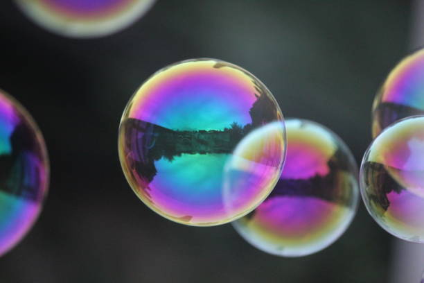 istock Colorful rainbow Soap bubbles outdoor 1269182630