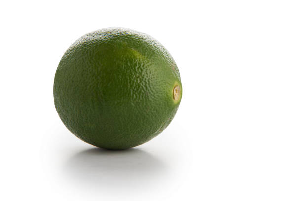 whole lime with clipping path on white background