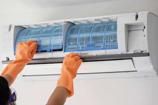 istock Asian man hand hold air conditioner filter cleaning concept 1269201203