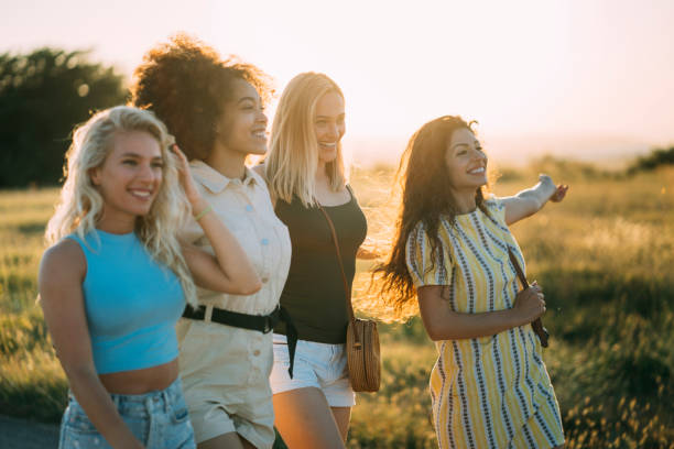 istock Group of women at sunset 1269201233