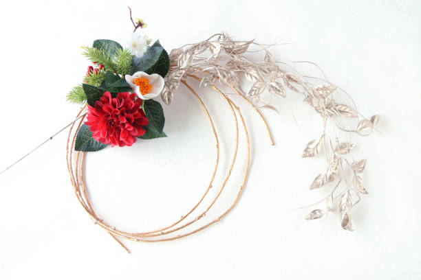 istock gold branch wreath --- red Camellia 1269202424