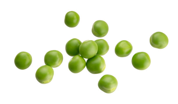 istock Fresh green peas isolated on white background 1269203166