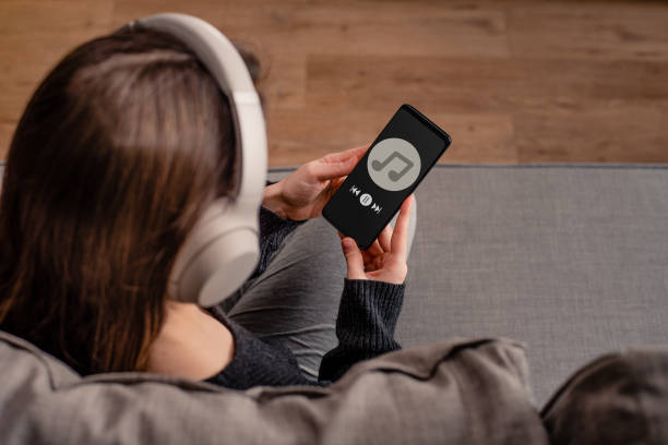 Woman using app to listening to music