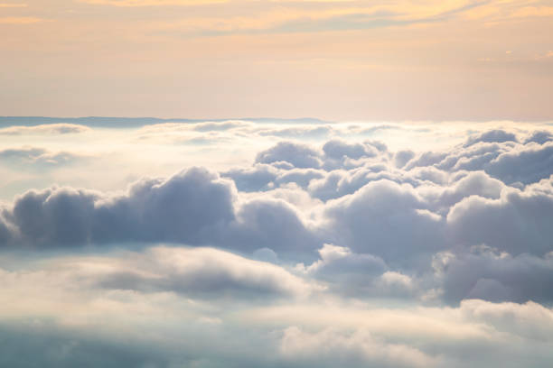 istock View at sunrise with puffy foggy. 1269207388