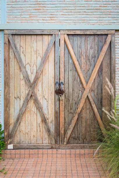 istock Old wooden double door was locked. 1269207396