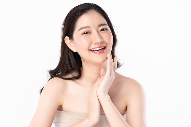 beautiful young asian woman with clean fresh skin, on white background, face care, facial treatment. cosmetology, beauty and spa. asian women portrait - 18639 imagens e fotografias de stock